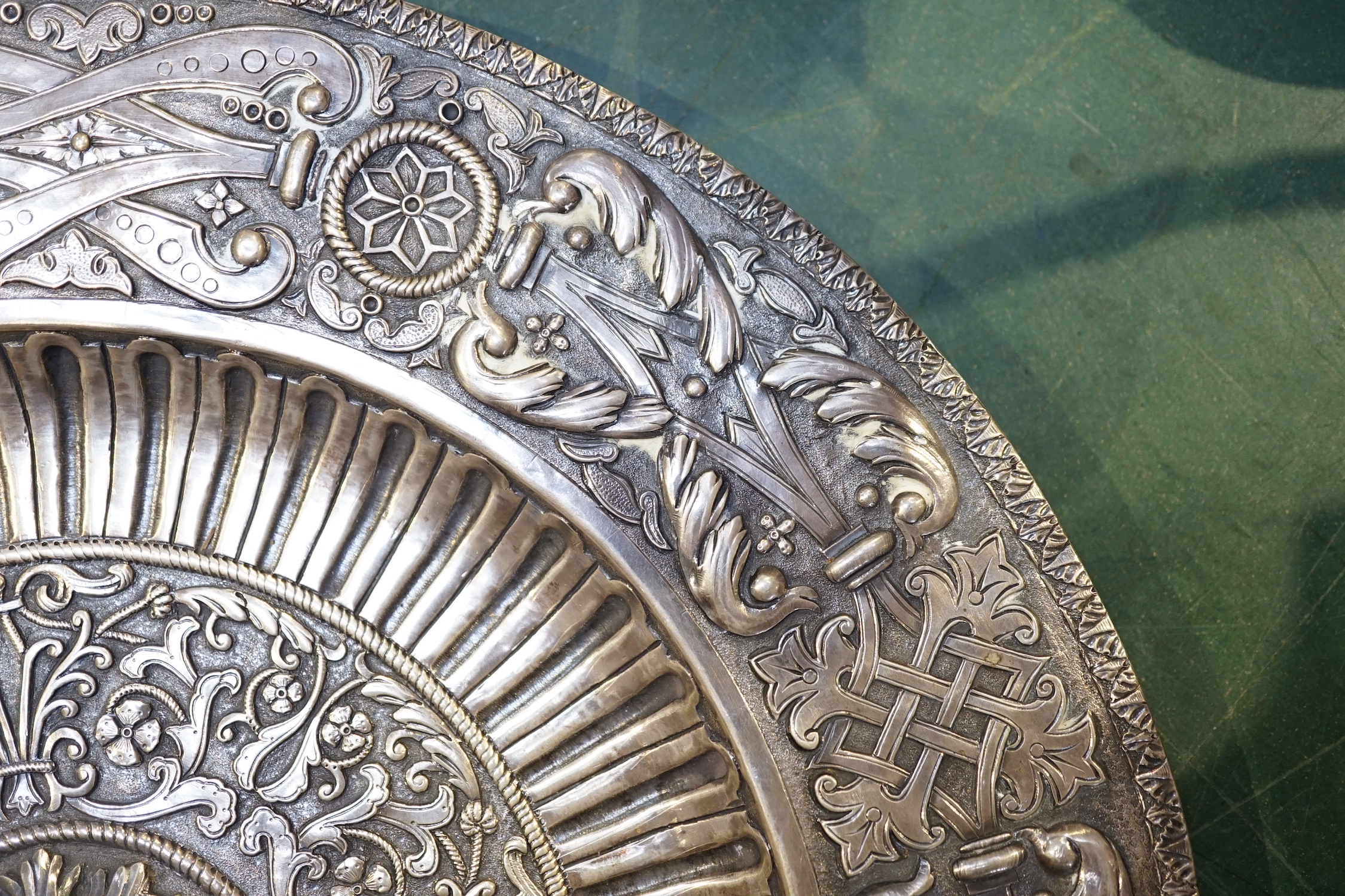 A 20th century Portuguese/Spanish embossed silver charger